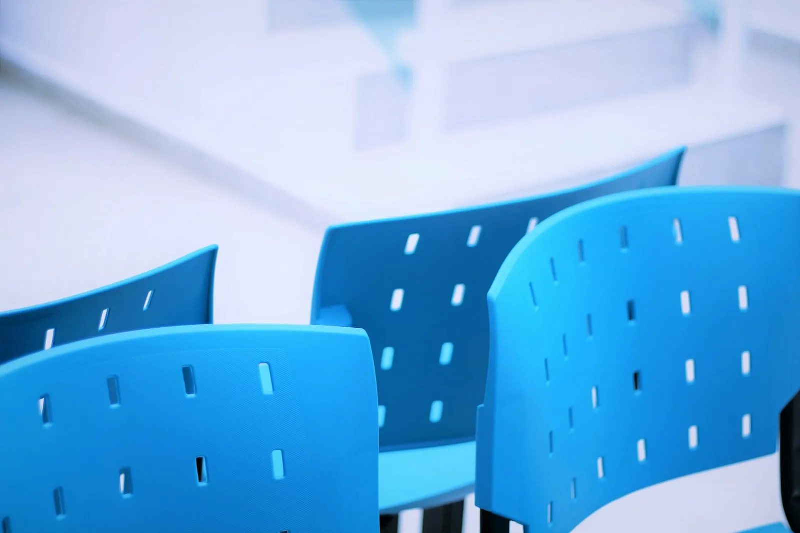 Empty chairs in a bright waiting area